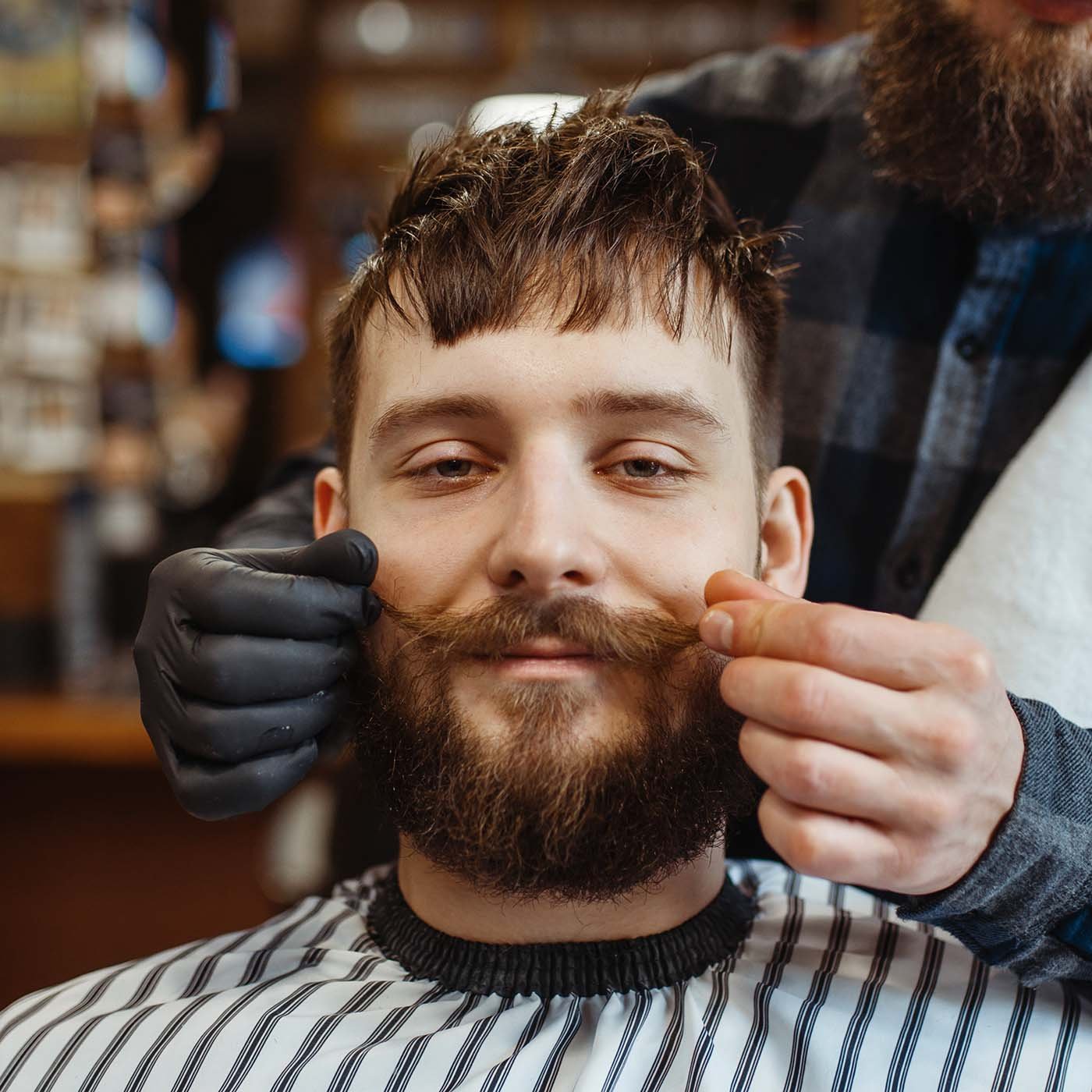 barber and customer with a mustache barbershop 2021 04 05 23 10 37 utc.jpg