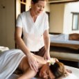 female message therapist giving a massage at a spa W7M4QPC.jpg