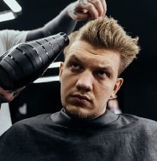 httpselements.envato.combarber drying male hair in hairdressing salon N6DFQ7A.jpg
