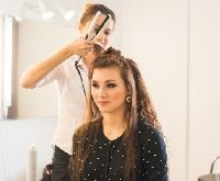 httpselements.envato.comhairdresser doing haircut for women in hairdressin P6JN4TZ.jpg