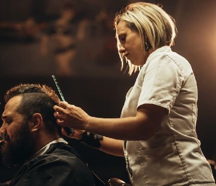 httpselements.envato.comyoung bearded man with a mohawk getting haircut by QXCAAB6.jpg