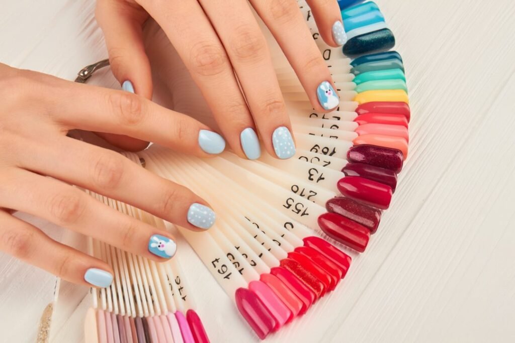 manicured hands and collection of nail samples.jpg